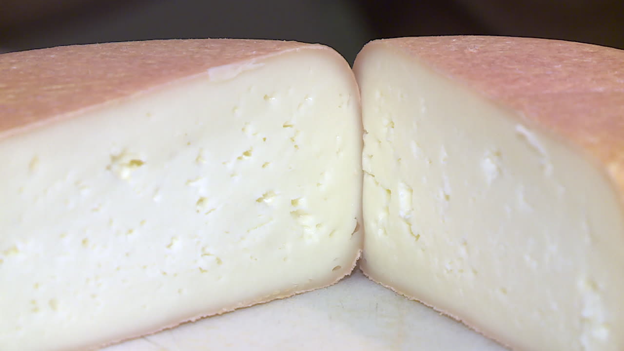 Sliced Wheel of Cheese