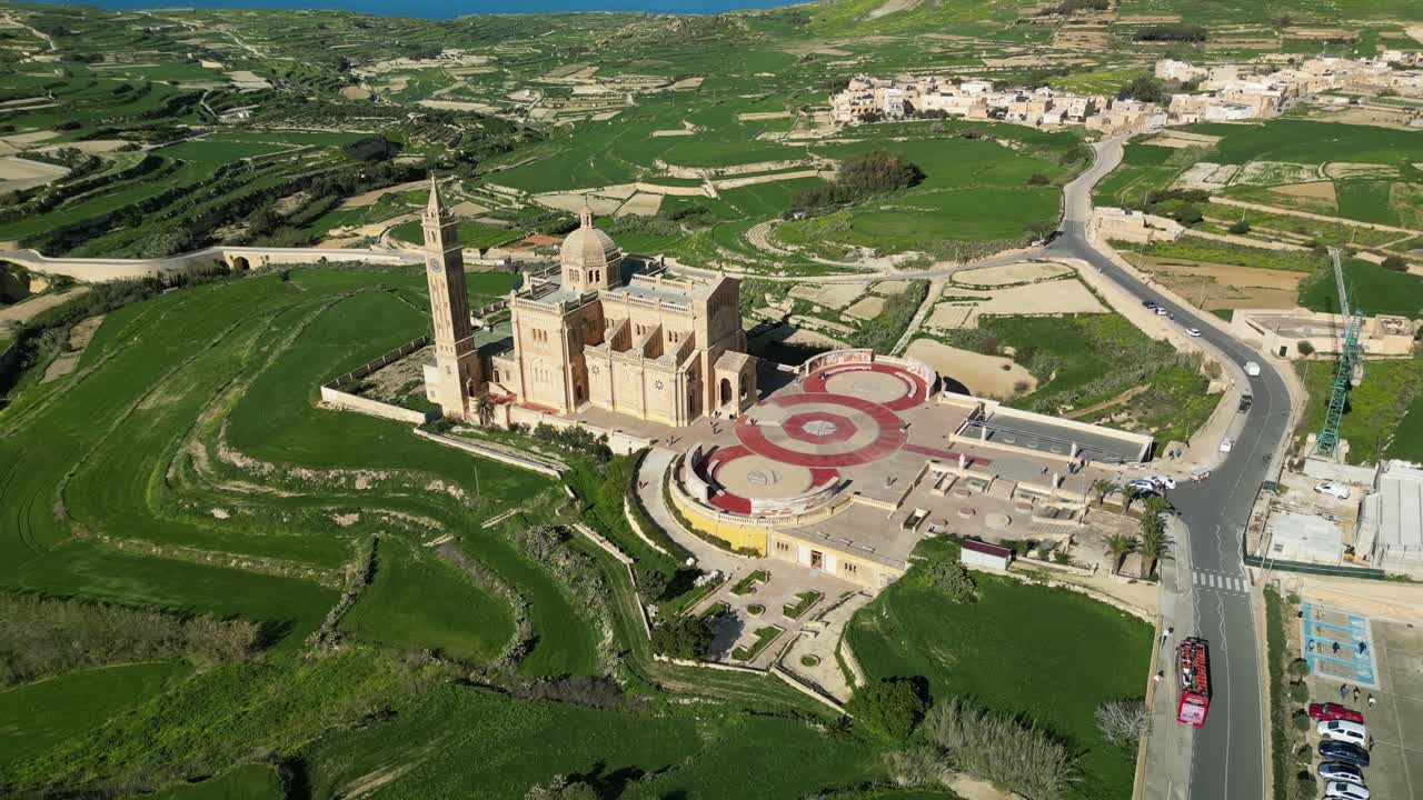 Drone Video Flying Left and Away From the Basilica of the National Shrine of the Blessed Virgin of Ta' Pinu in Gozo, Malta