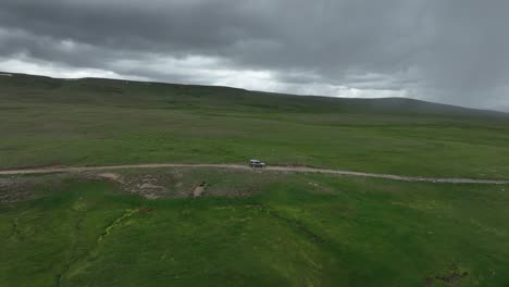 solitary vehicle on deosai track, skardu, pakistan