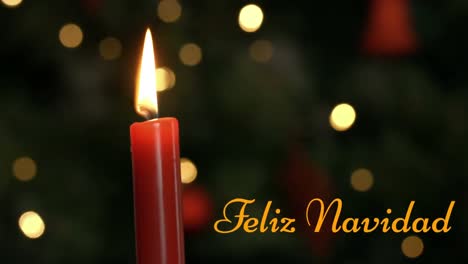 feliz navidad escrito sobre una vela encendida