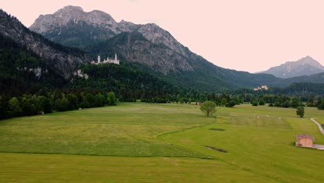 Farmland-flyover-at-Neuschwanstein-Castle-near-Fussen-in-southwest-Bavaria,-Germany-1