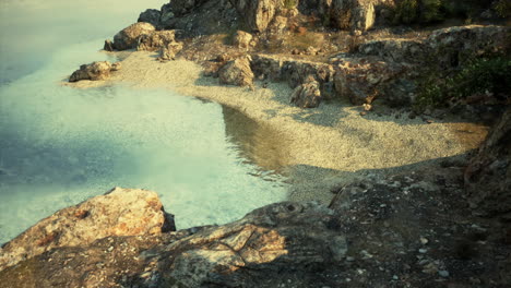 rocky beach with calm water