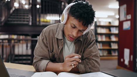 student studying in library