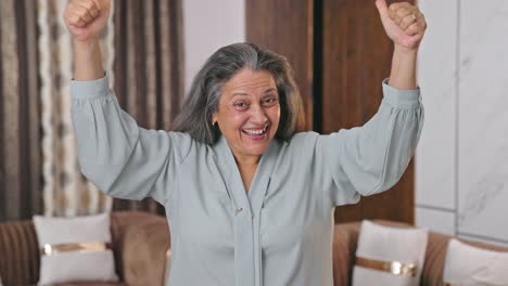 indian mother cheering and celebrating