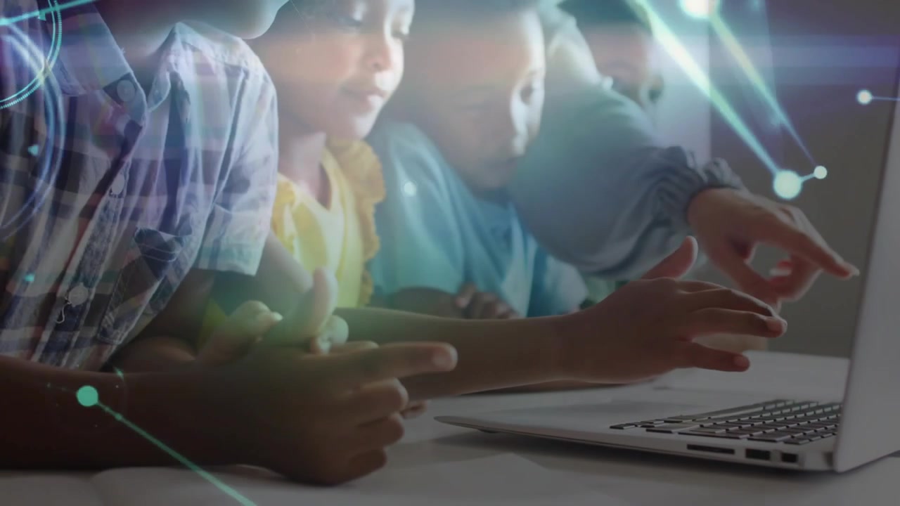 Teacher pointing at laptop and guiding children typing clicking with network overlay in edtech
