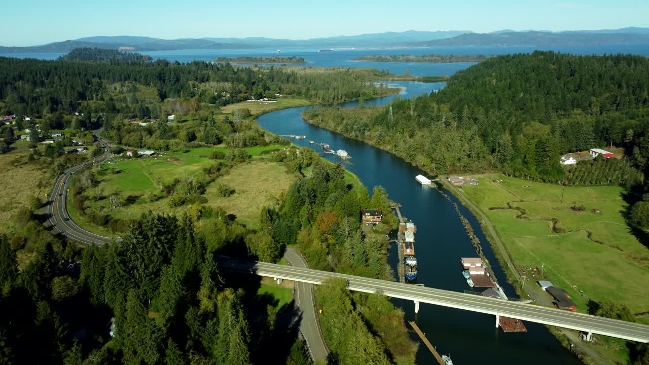 US, OR, Fern, 2025-10-21 - Drone view of houseboats and a highway bridge on the John Day River and Columbia River near Astoria, Oregon in Fall