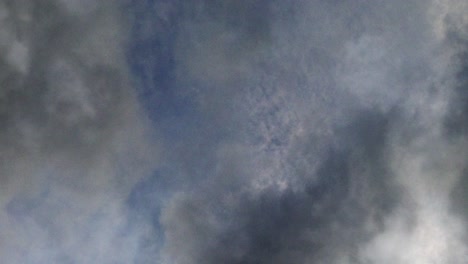 point of view, blue sky with dark clouds around it