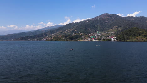 boating on begnas lake - freshwater lake in pokhara metropolis of kaski in nepal