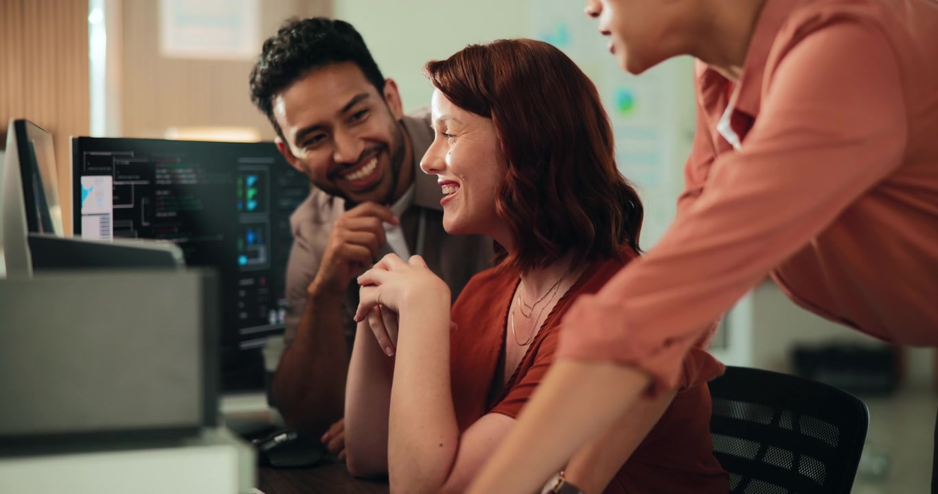 Diverse Team Collaborating on Project in Modern Office