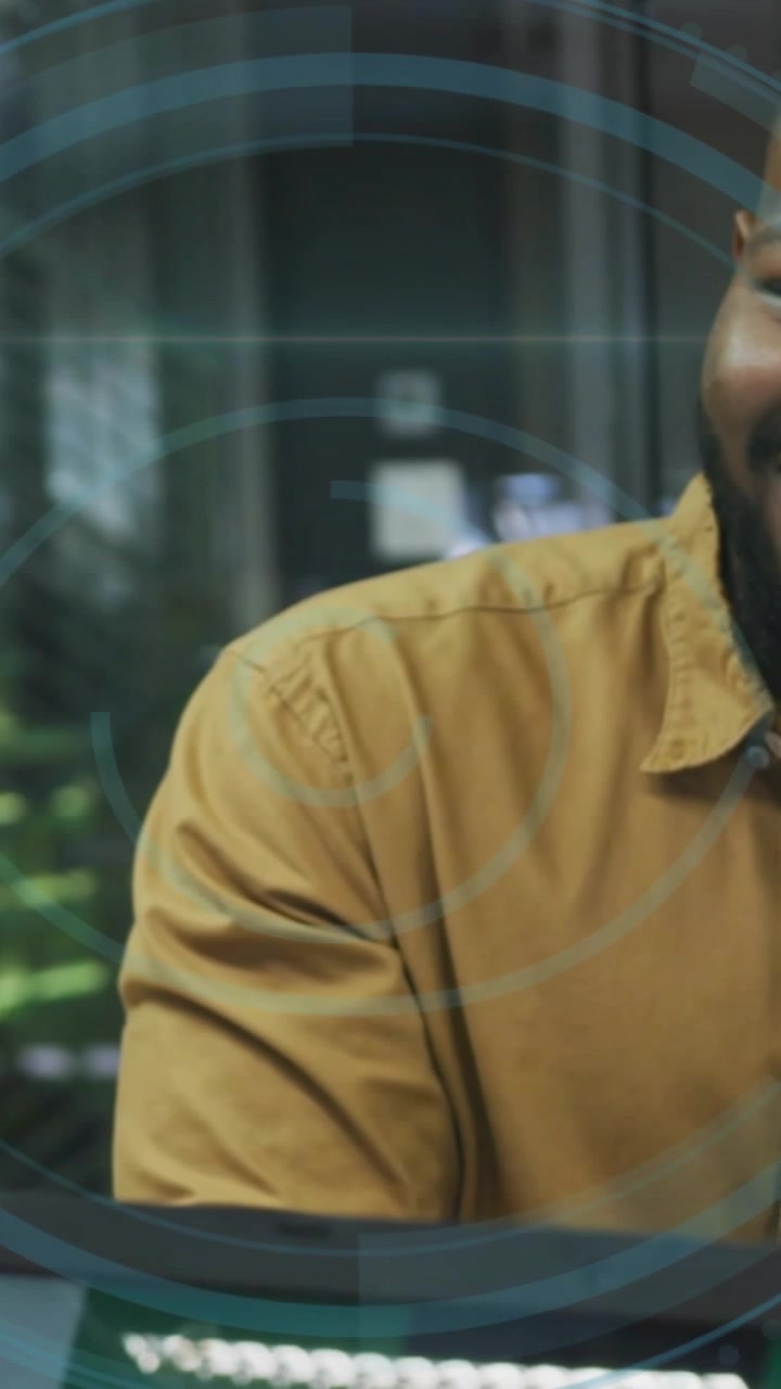 Vertical video: Man in mustard shirt moving into frame while HUD expanding, causing security reveal