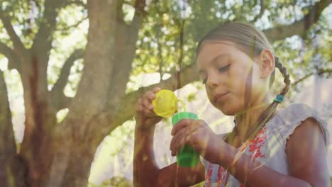 Girl-blowing-bubbles-at-a-park