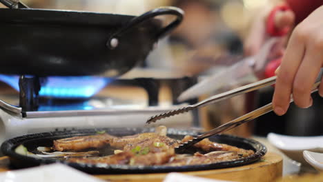 Serving-a-Dish-in-a-Korean-Restaurant