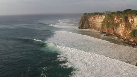 cliffs and coastline in uluwatu bali - one of the best surf destinations in the world
