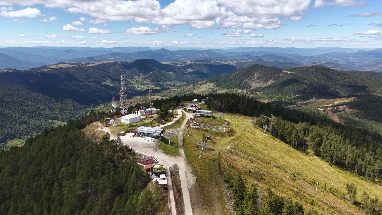 Aerial View of Tornik Peak, Zlatibor Mountain, Serbia, Gondola and Ski Lift, Communication Towers and Landscape on Sunny Summer Day