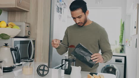 Breakfast,-relax-and-coffee-with-man-in-kitchen