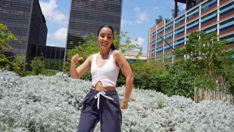 Woman Dancing in Urban Park