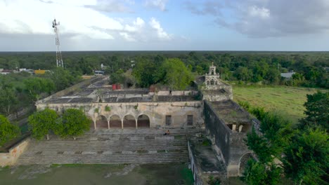 reverse drone shot of abandoned hacienda de uayalceh in yucatan mexico