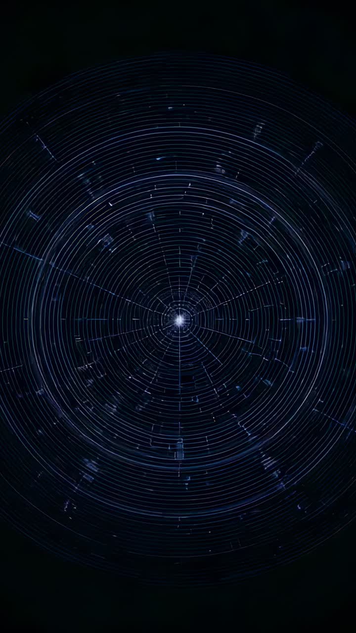 Video verticale: grafica circolare pulsante che inizia con un nodo luminoso che ruota su uno sfondo scuro con anelli