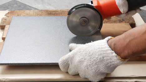 cut the tiles with an electric grinder.