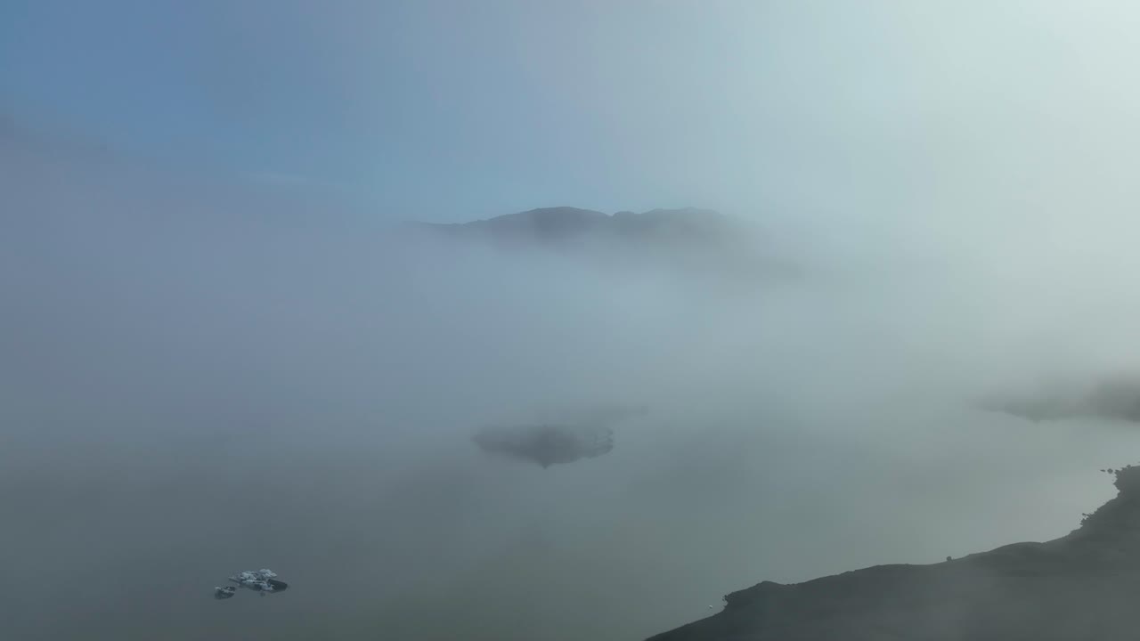 Foggy and moody view over S&oacute;lheimajokull glacier lagoon in South Iceland