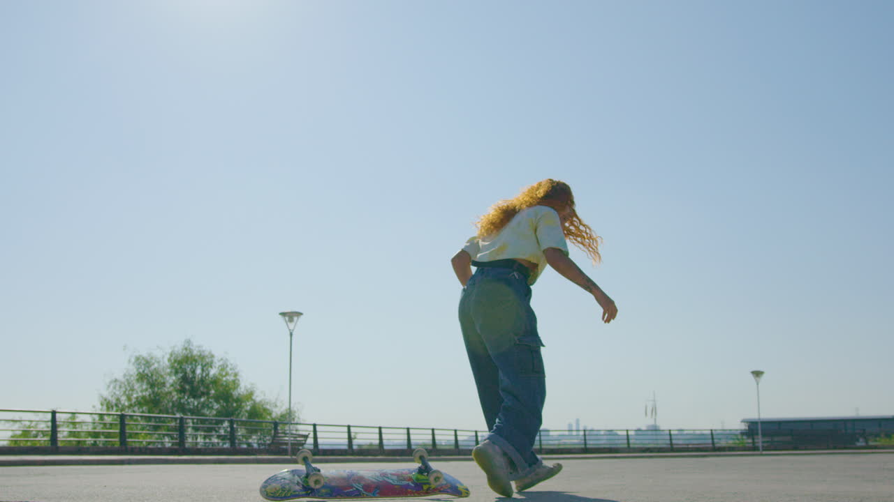 Female Skateboarder fail skateboard trick slow motion urban sport