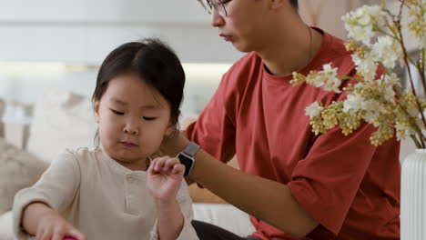 father and daughter bonding at home
