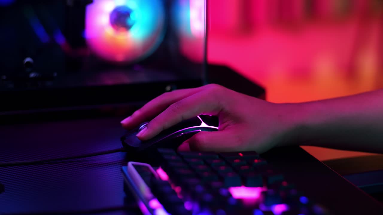 Close Up Of Pro Cyber Sport Gamer Play Game With Rgb Keyboard And Mouse