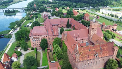 vast gothic layout of malbork castle and nearby nogat river. malbork, poland