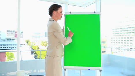 woman in suit giving a presentation