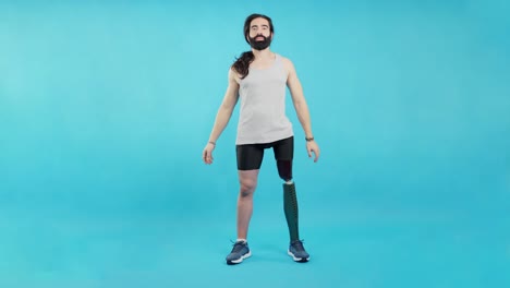 confident man with prosthetic leg smiling on blue background