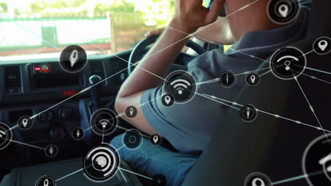 animation of network of connections with icons over caucasian man using smartphone in car