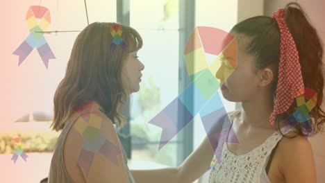 talking, two women with rainbow awareness ribbons animation over them