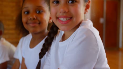 Schoolkids-relaxing-in-the-basketball-court-at-school-4k