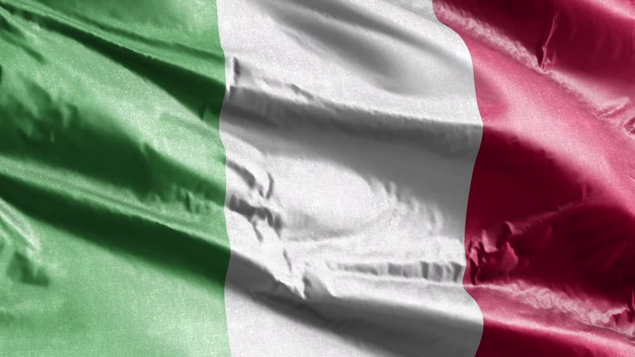 Italy textile flag slow waving on the wind loop. Italian banner smoothly swaying on the breeze. Fabric textile tissue. Full filling background. 20 seconds loop.