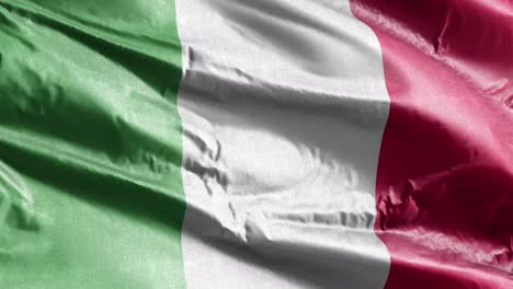italy textile flag slow waving on the wind loop. italian banner smoothly swaying on the breeze. fabric textile tissue. full filling background. 20 seconds loop.