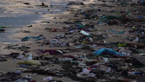 Plastic Bags And Bottles Piled On The Beach After The Typhoon