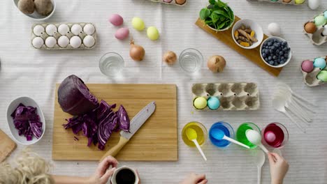 top view video of coloring easter eggs on the table