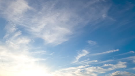 light weightless spindrift clouds flying in the skies. summer season azure skies from low angle view. timelapse.