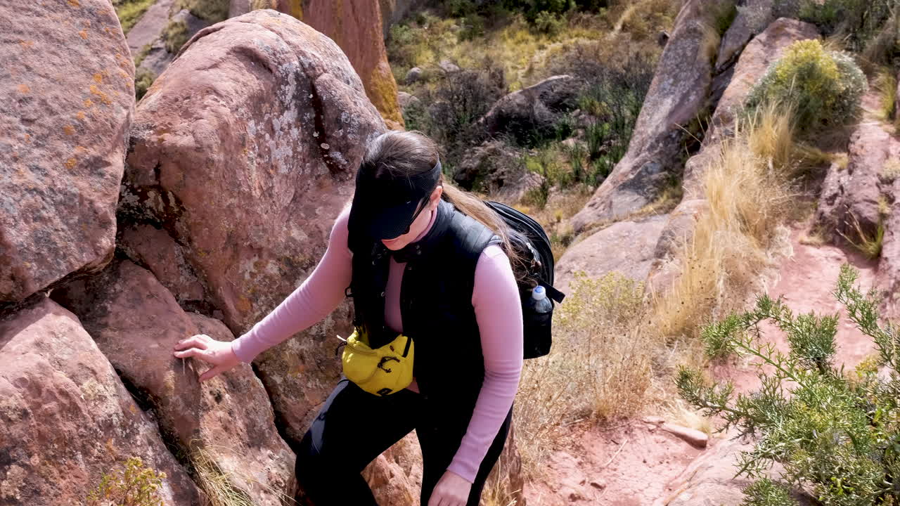 Embark on a scenic hike along the rugged trails of Aramu Muru, Peru, leading to a breathtaking viewpoint