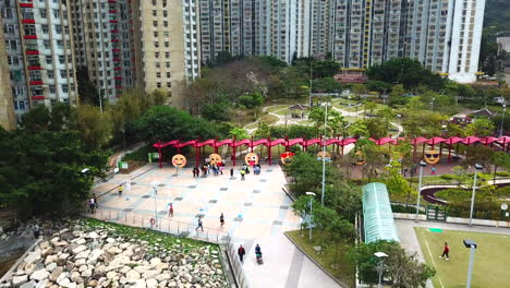 urban park with giant emoji sculptures