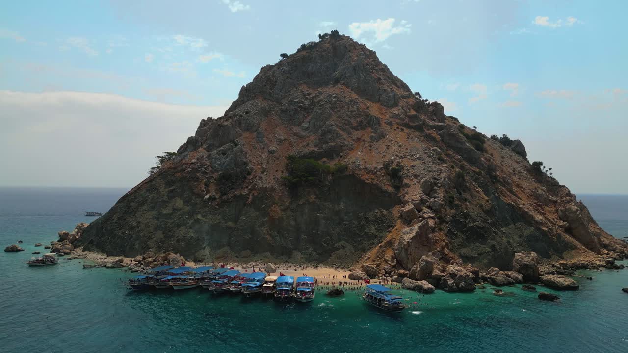 Stunning aerial footage captured by drone showcasing the crystal-clear turquoise waters and white sand beaches of Suluada Island - 4K Cinematic Drone Footage - Suluada - Turkey_03