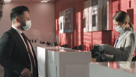 business man passing passport control in airport