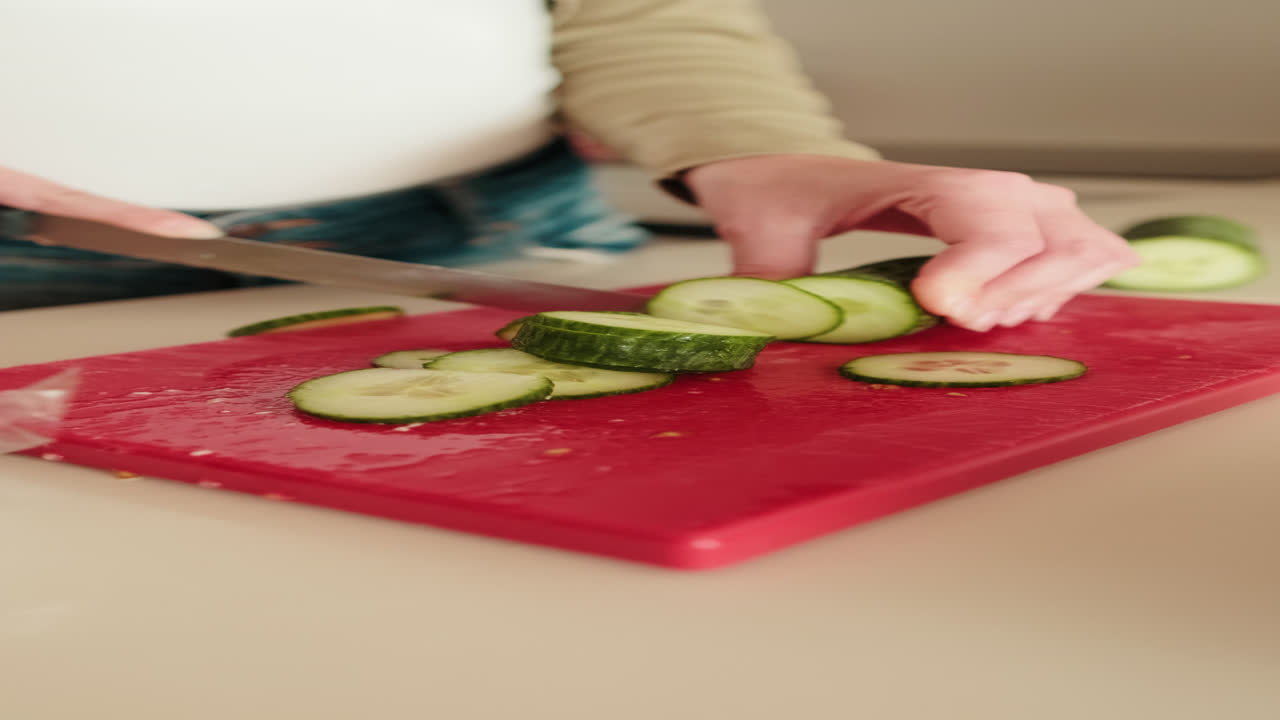 Woman Making Healthy Salad in Kitchen. Foodblog