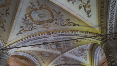 baroque ceiling art with skulls in historic evora chapel of bones interior