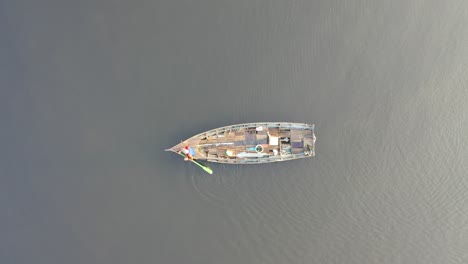 wooden fishing boat on a calm river