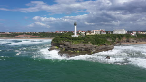 flying around biarritz white lighthouse sunny day basque country