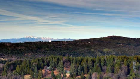 forest mountains overlooking palomar observatory in san diego county, california, united states. aerial drone shot