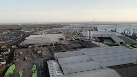 industrial buildings and wind turbines at the port