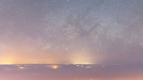 Timelapse-of-the-milky-way-rising-over-Gran-Canaria-Island,-Canary-Islands