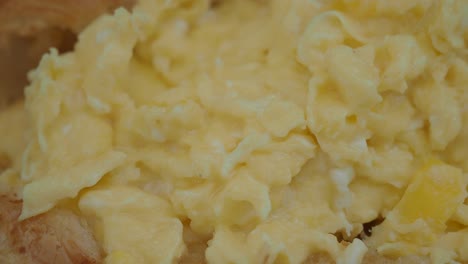 scrambled eggs on croissant